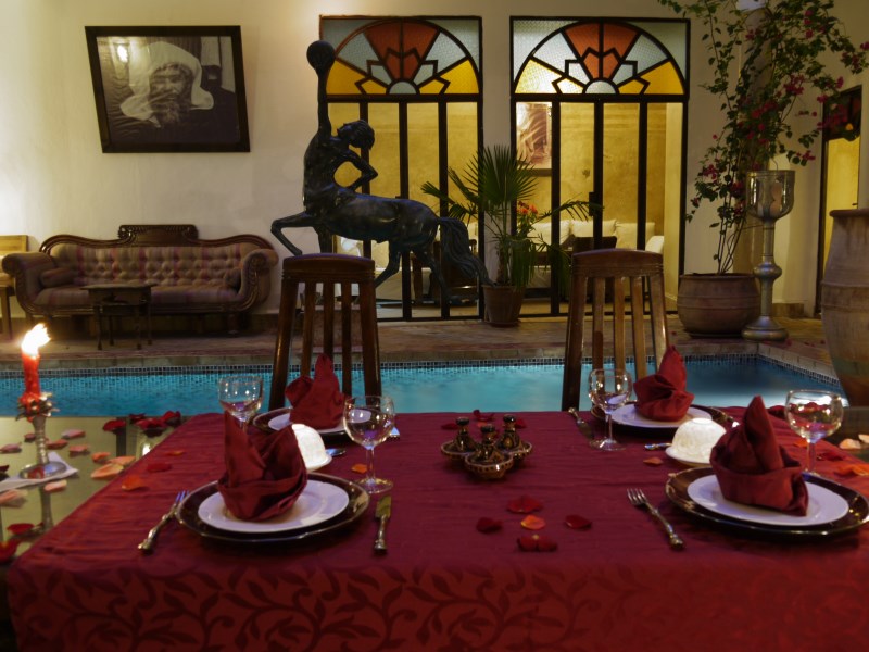 Fine dining and evening entertainment at Riad El Zohar, overlooking the stunning pool